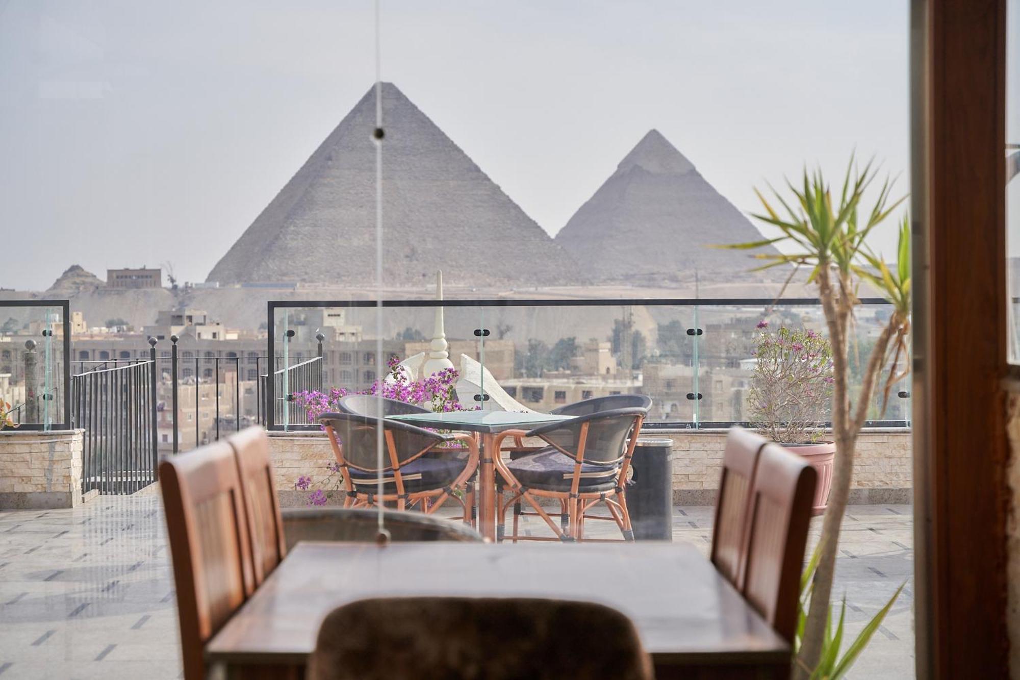 Appartamento Sunrise Jacuzzi & Pyramids View Il Il Cairo Esterno foto