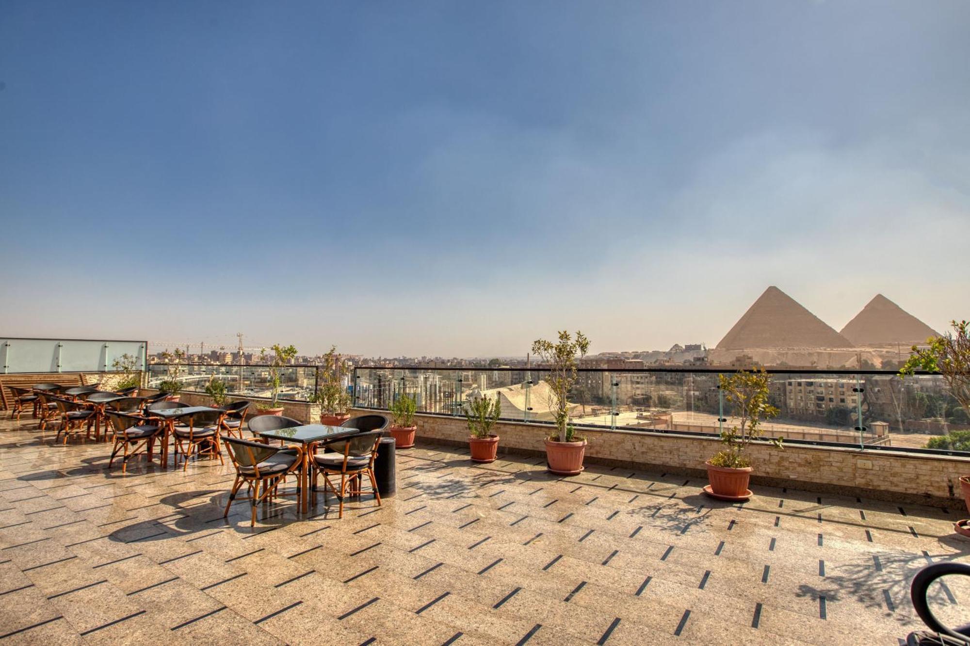 Appartamento Sunrise Jacuzzi & Pyramids View Il Il Cairo Esterno foto